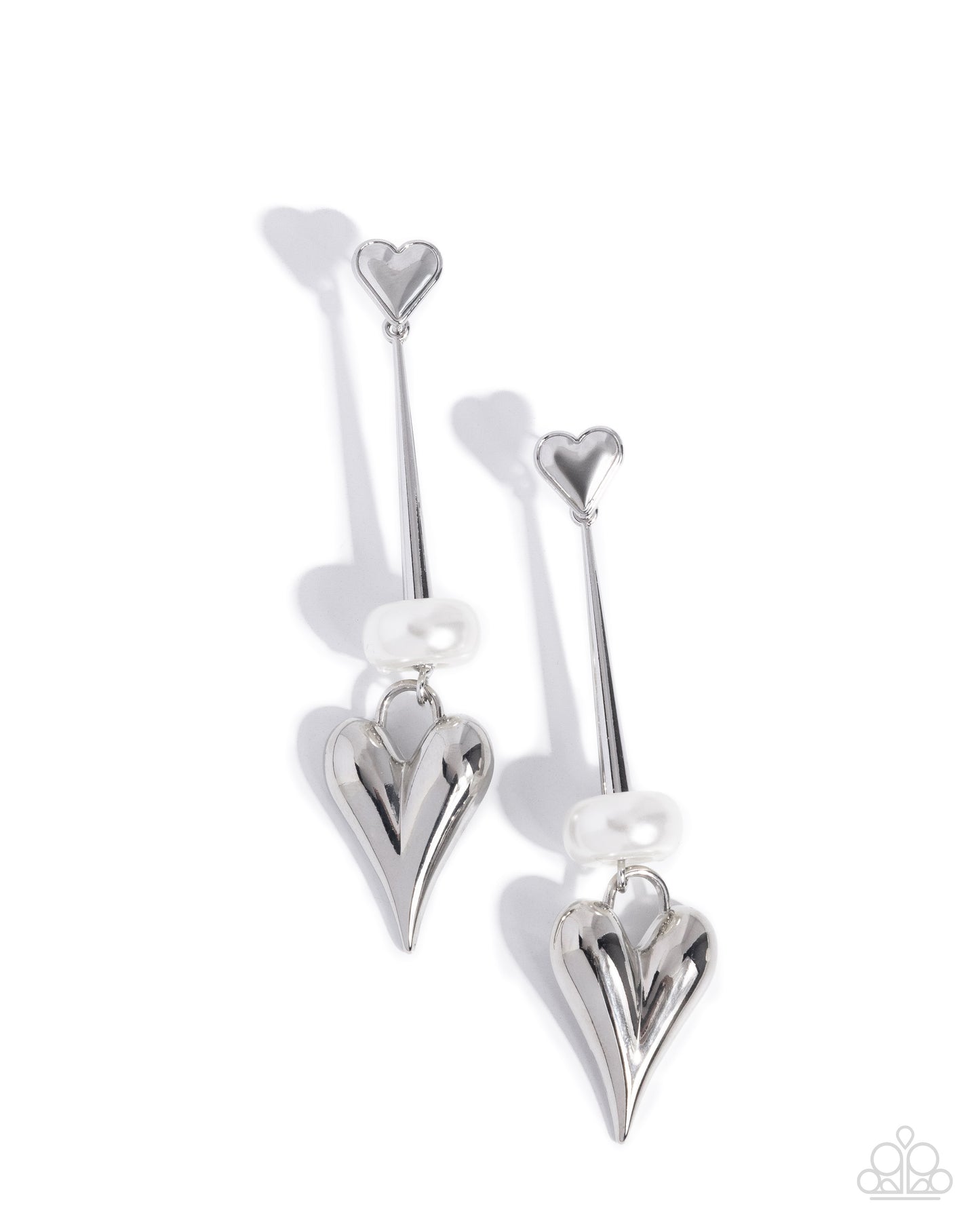 Silver heart-shaped earrings on a white background