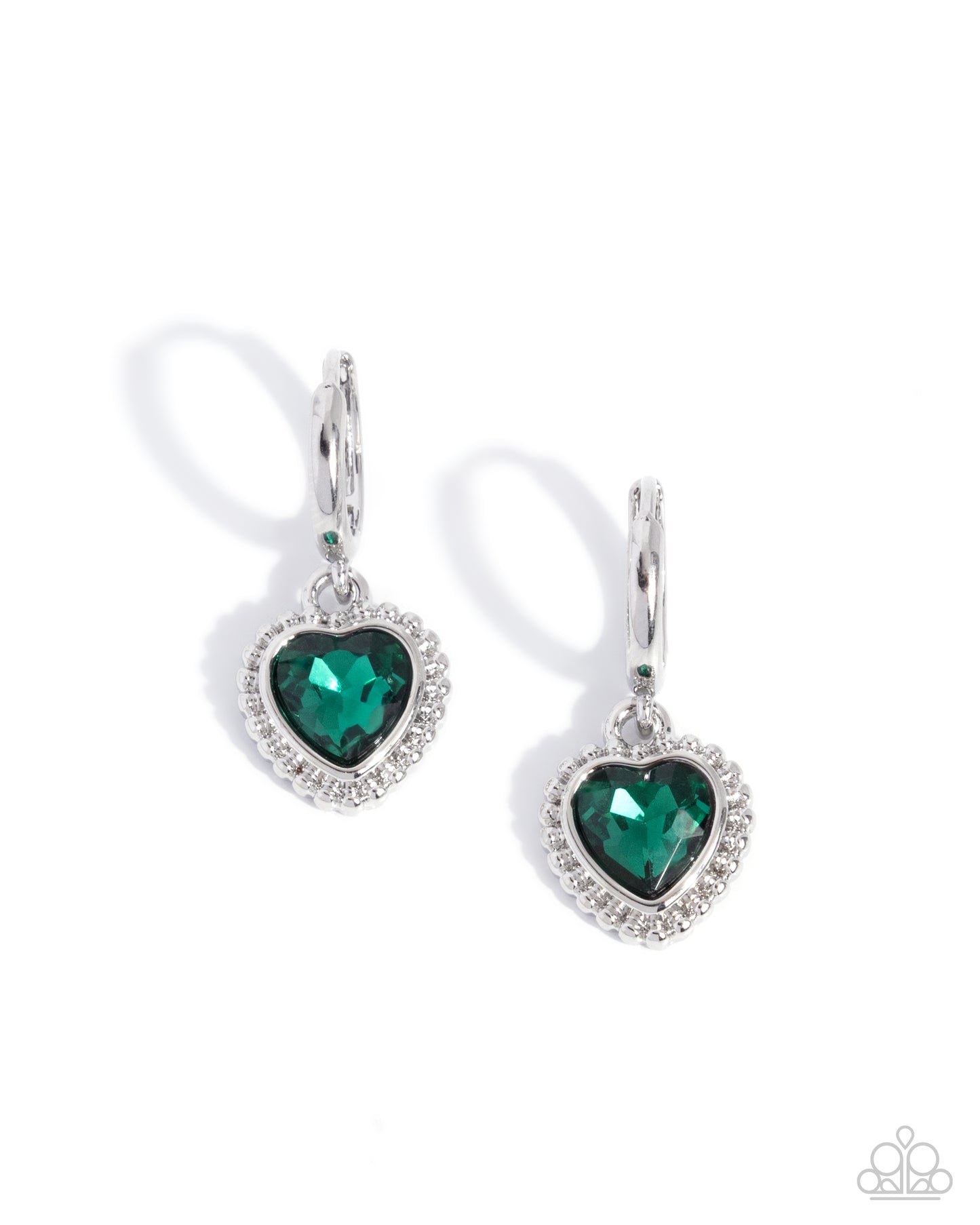 Pair of heart-shaped green earrings with silver accents on a white background
