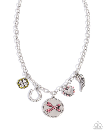 Necklace with various charms on a white background