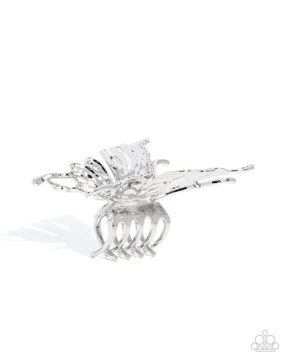 Silver hair clip on a white background