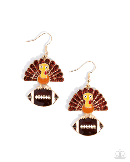 Turkey and football-themed earrings on a white background