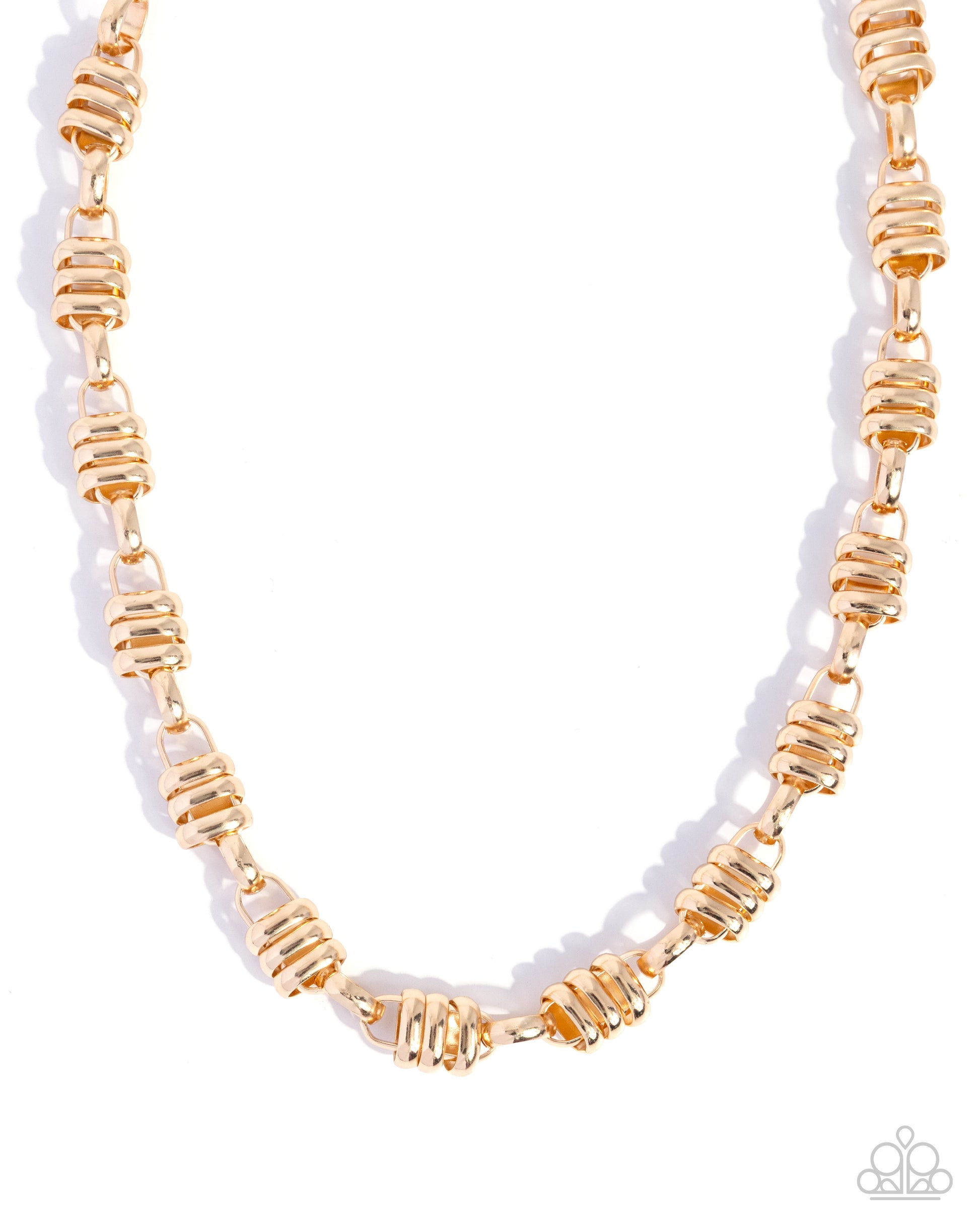 Gold beaded necklace on a white background