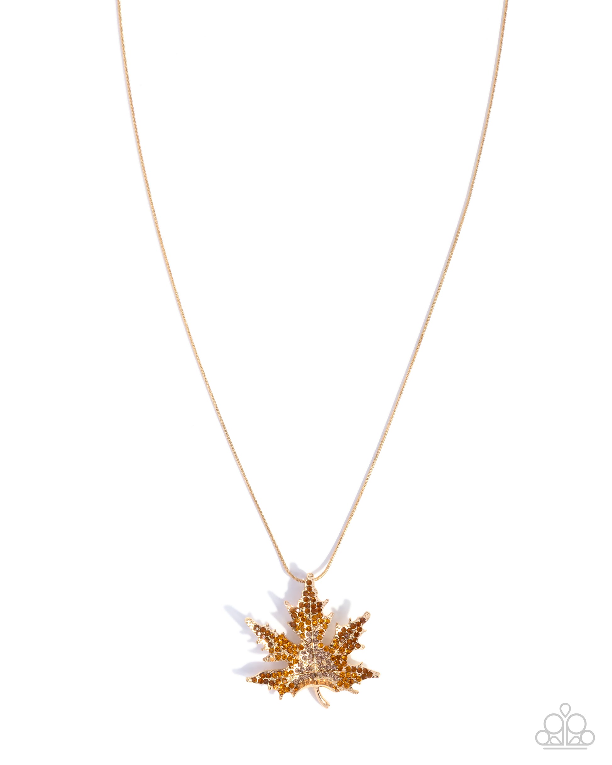 Gold maple leaf pendant necklace on a white background