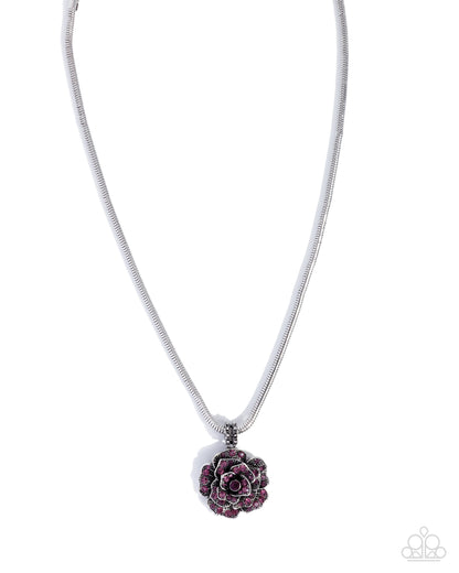 Necklace with a purple flower pendant on a white background