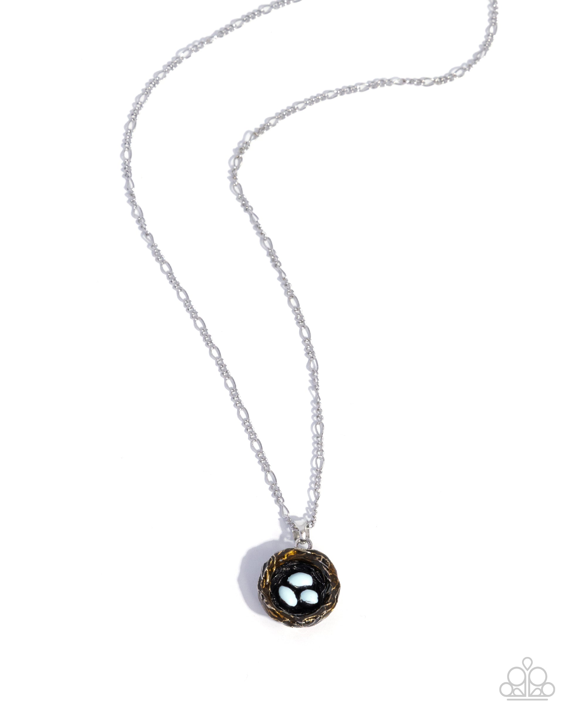 Necklace with a black and gold pendant on a white background
