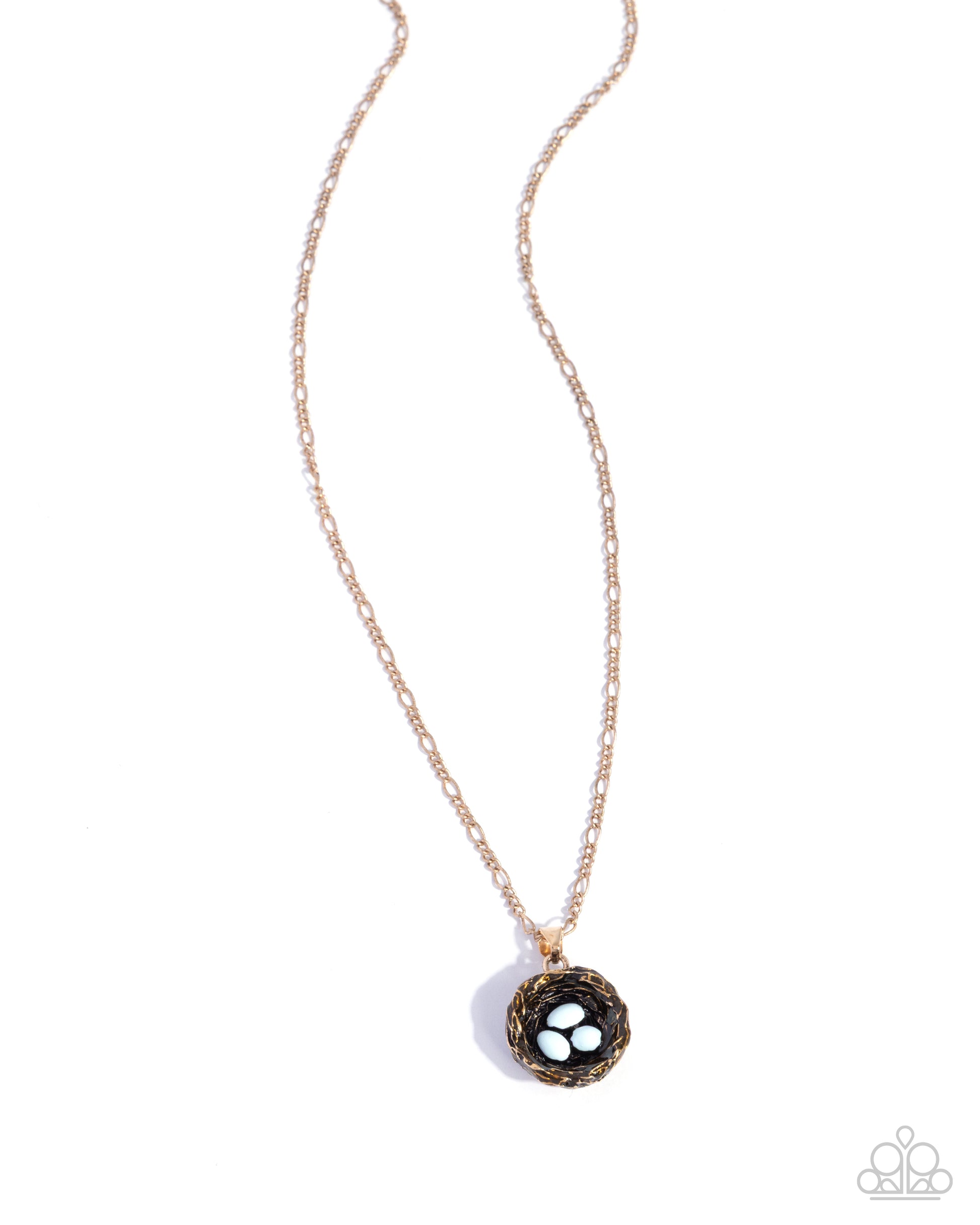 Necklace with a black and gold pendant on a white background