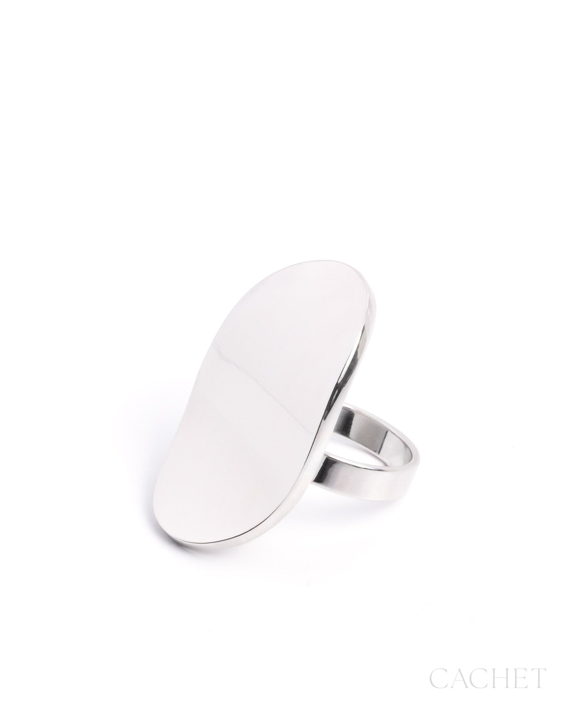 Silver ring with a flat, oval-shaped top on a white background