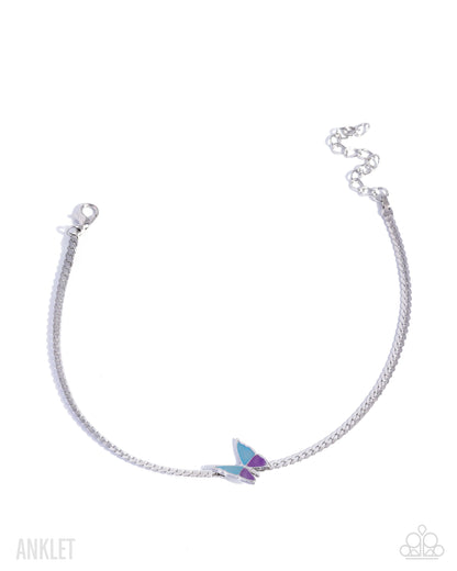 Silver anklet with a colorful butterfly charm on a white background