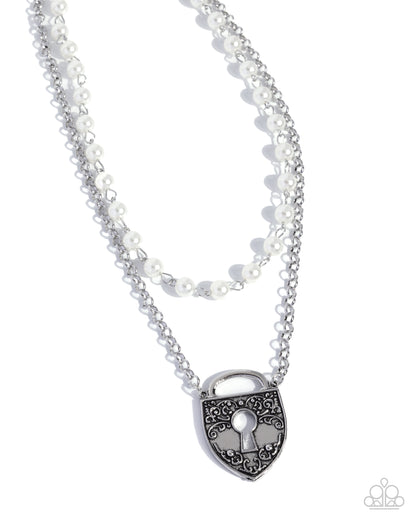 Necklace with a silver padlock charm on a white background