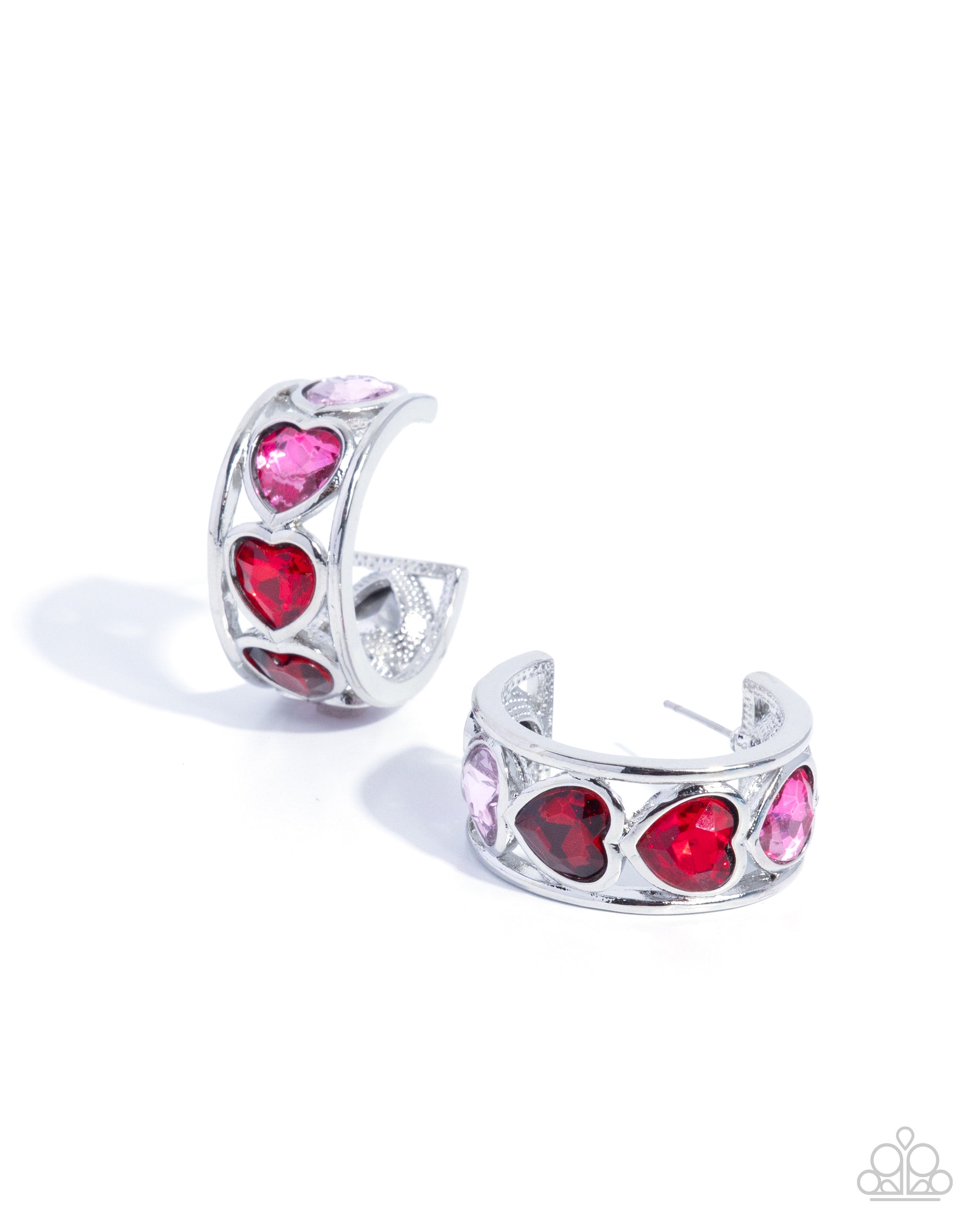 Pair of silver hoop earrings with red and pink gemstones on a white background