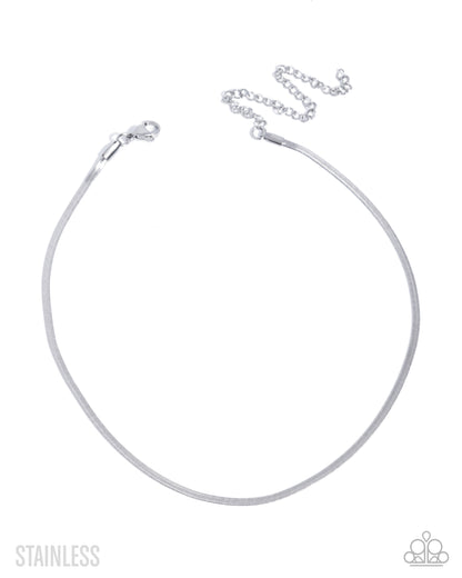 A silver stainless steel snake chain necklace with a lobster clasp and extender chains, shown on a plain white background with 'STAINLESS' text and a small logo watermark.