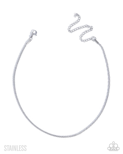 Silver chain necklace on a white background