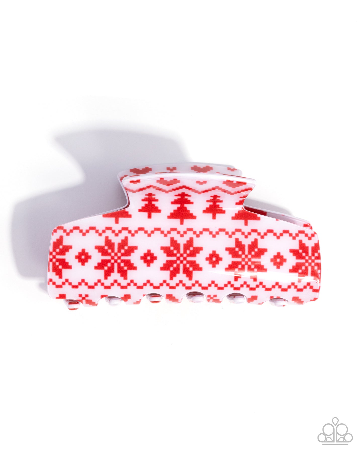 Red and white patterned hair clip on a white background