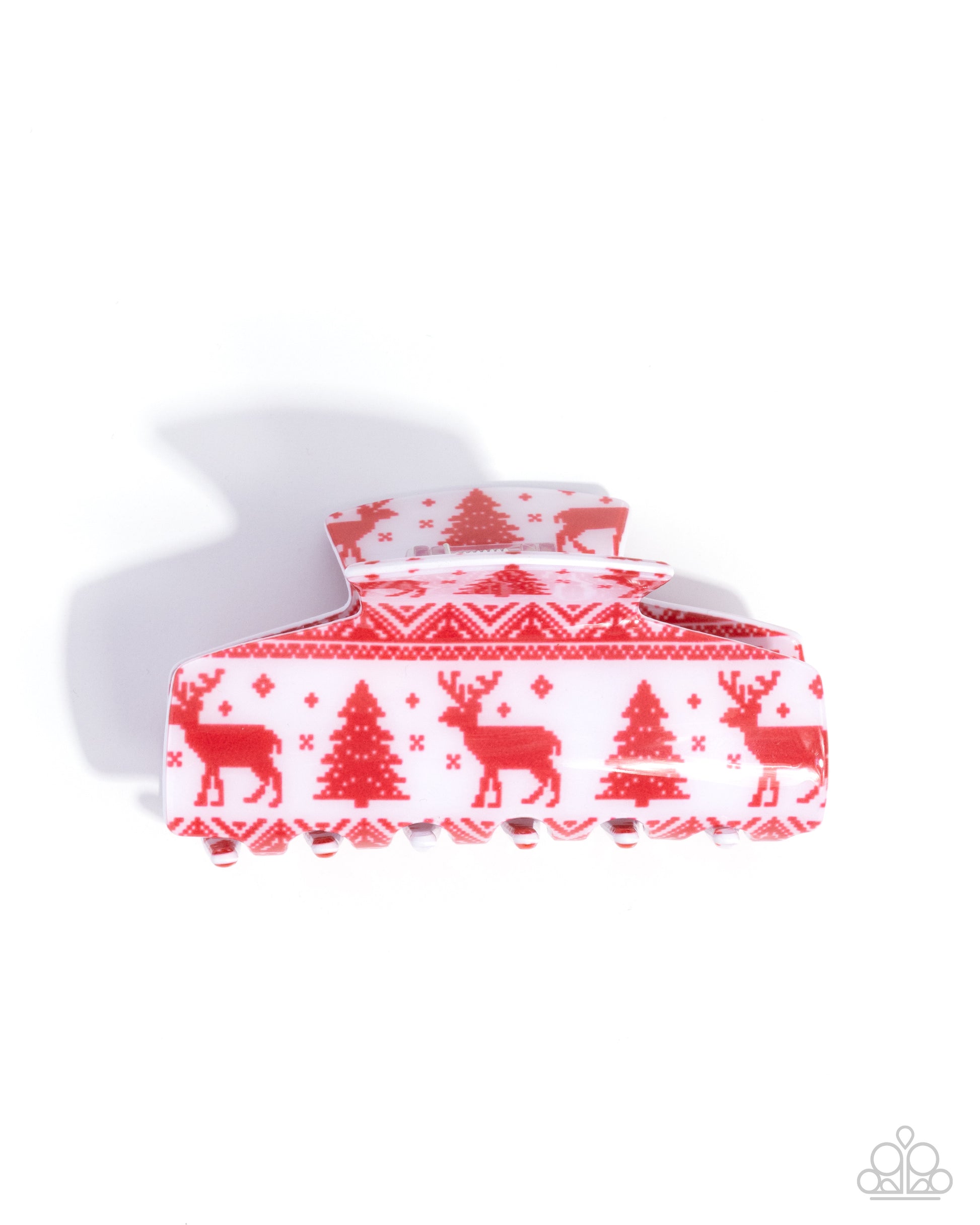 Red and white patterned box with reindeer and Christmas tree design on a white background