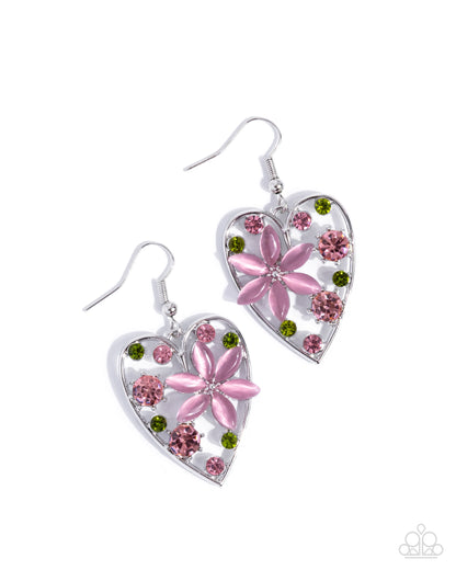 Heart-shaped earrings with pink floral designs on a white background
