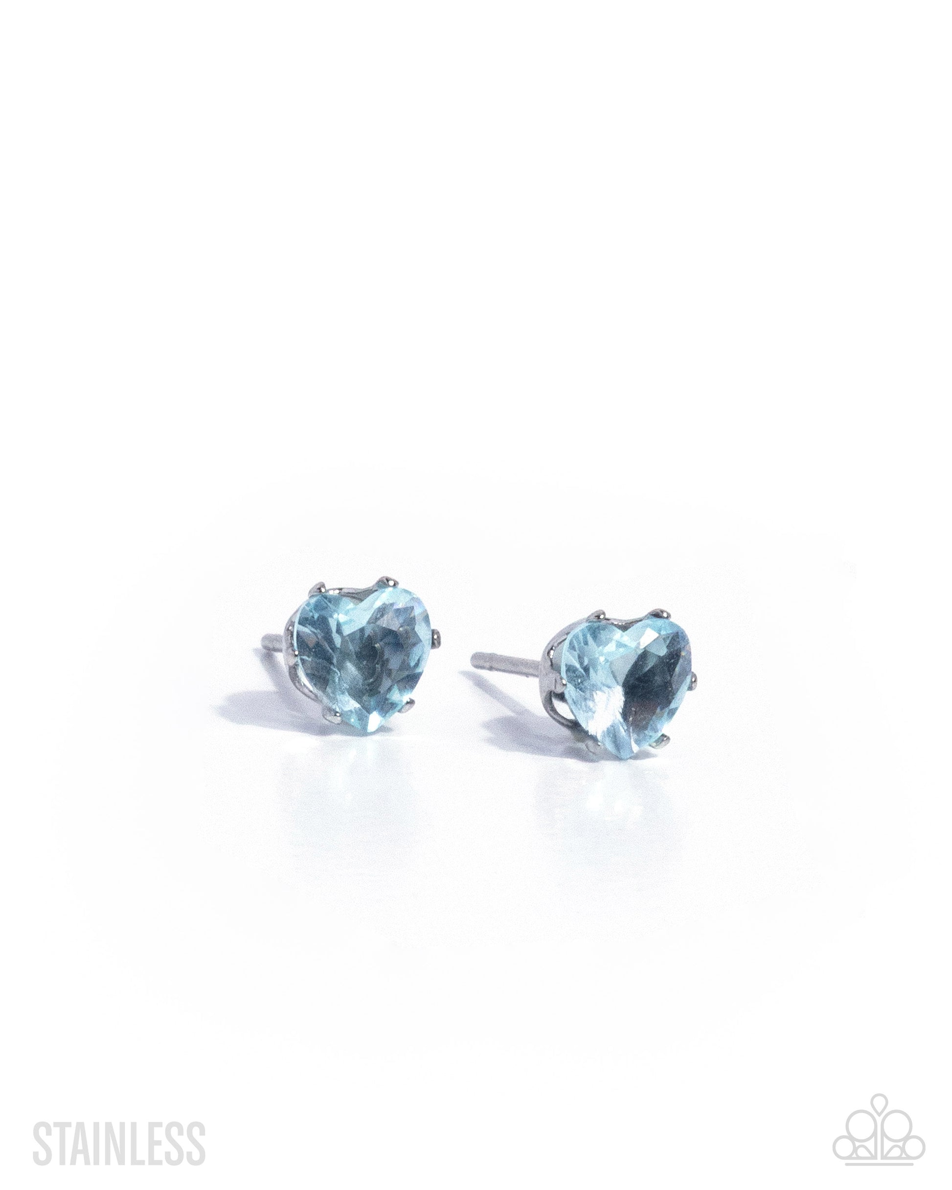 Heart-shaped blue gemstone stud earrings on a white background