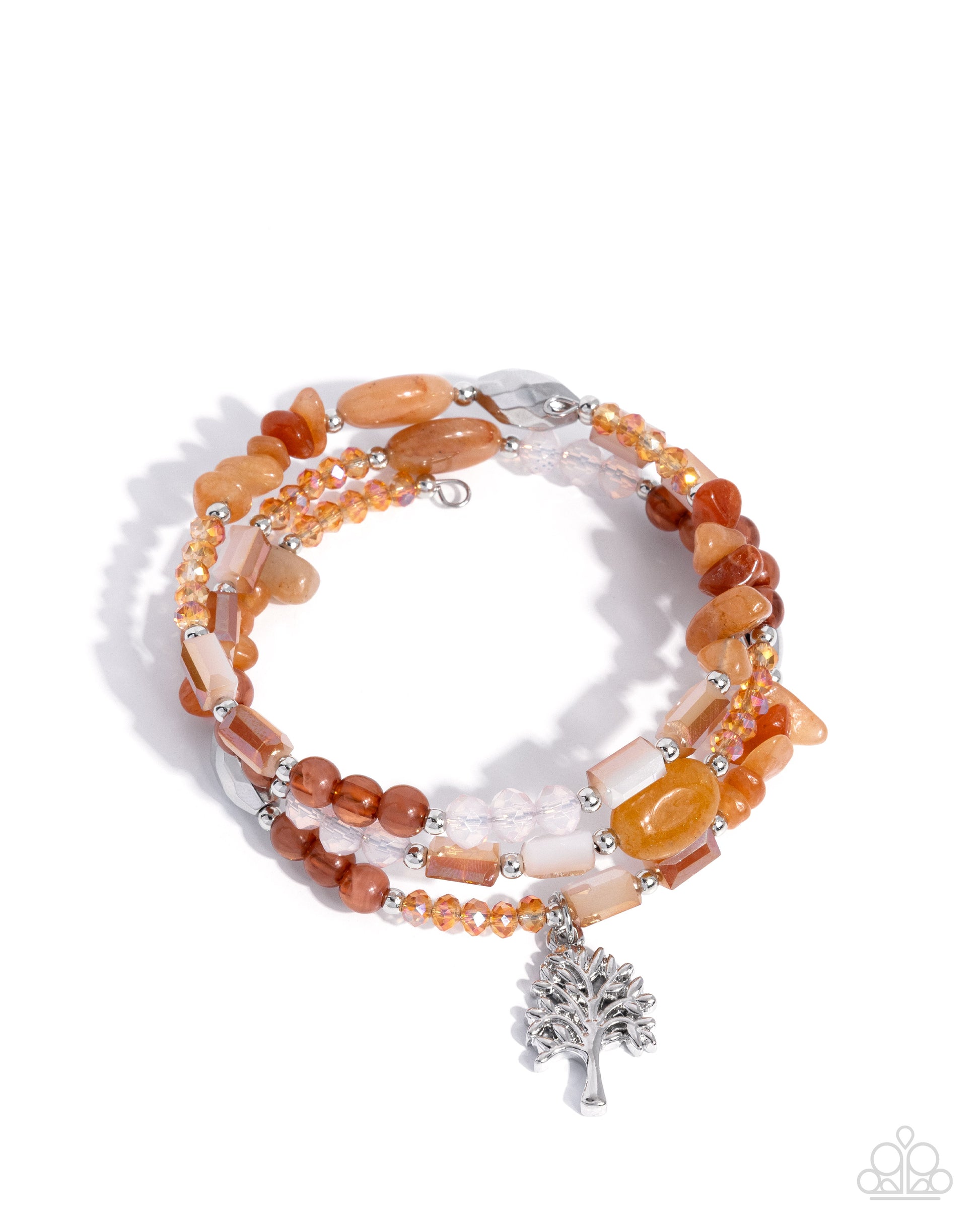 Multistrand beaded bracelet with tree charm on a white background