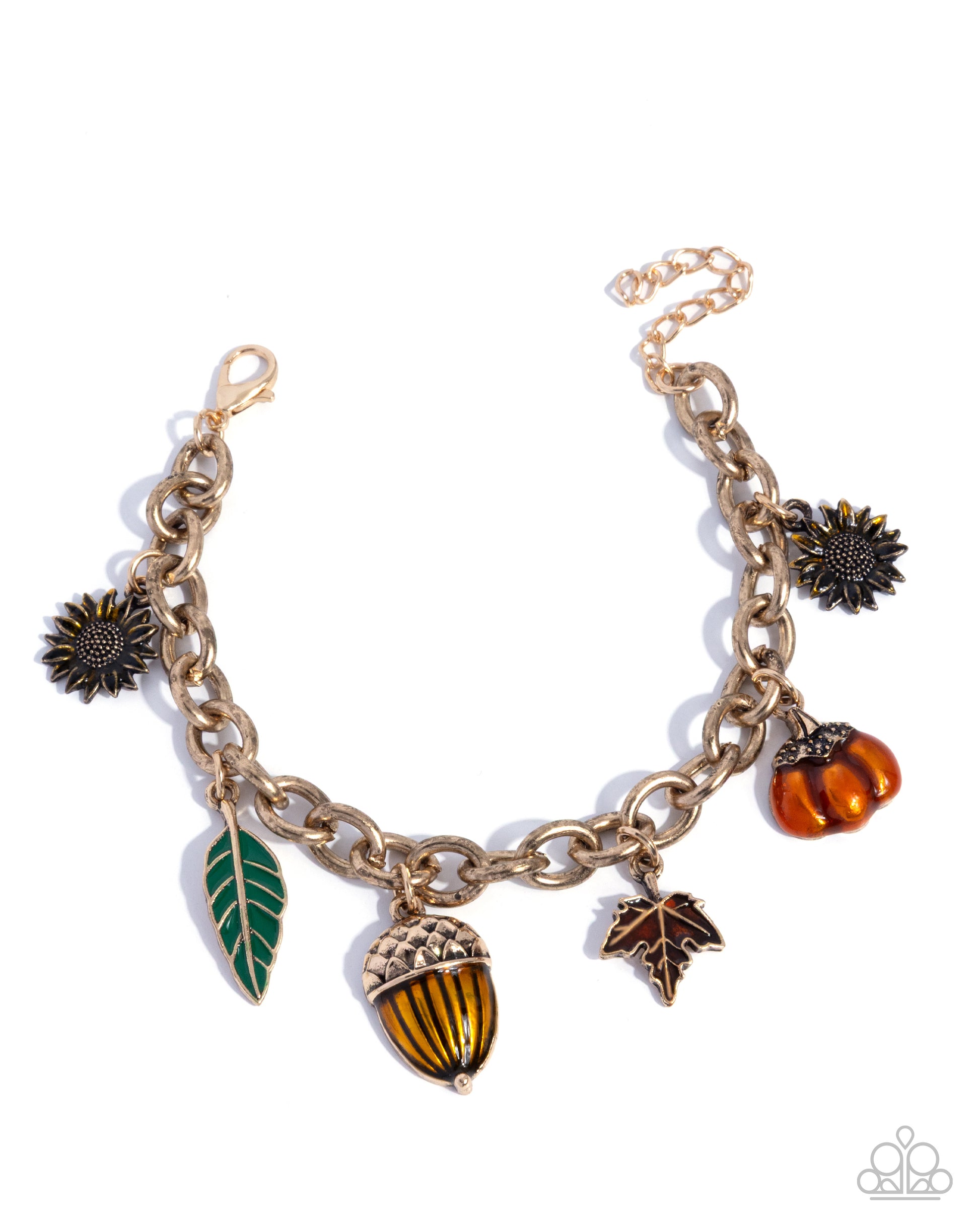 Gold bracelet with autumn-themed charms on a white background