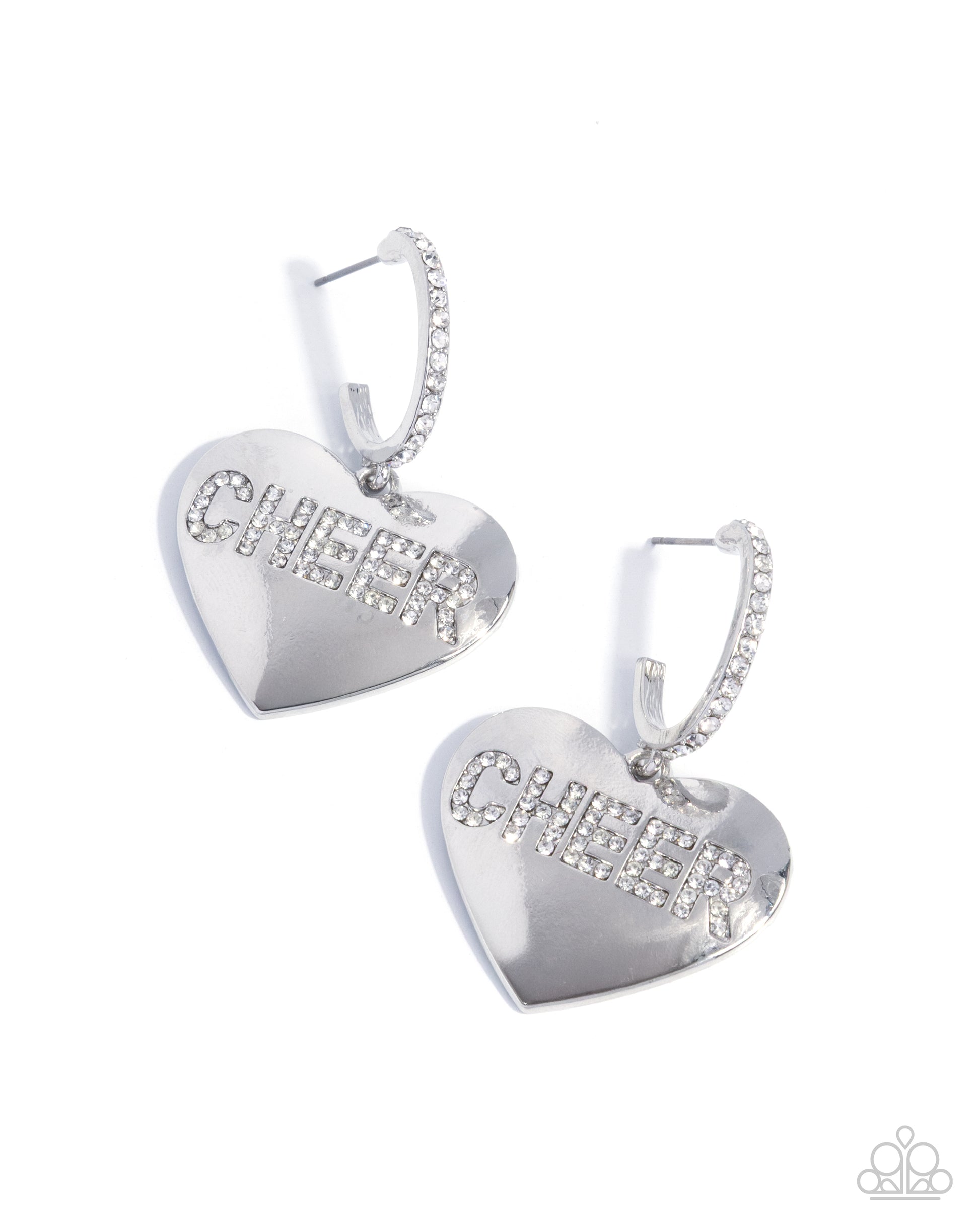 Heart-shaped silver earrings with clear gemstones on a white background