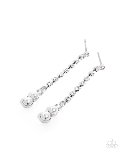 Silver chain earrings with small pearls on a white background
