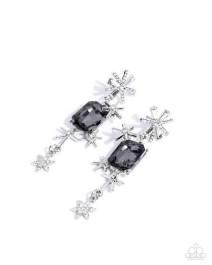 Pair of earrings with black gemstones and star-shaped elements on a white background