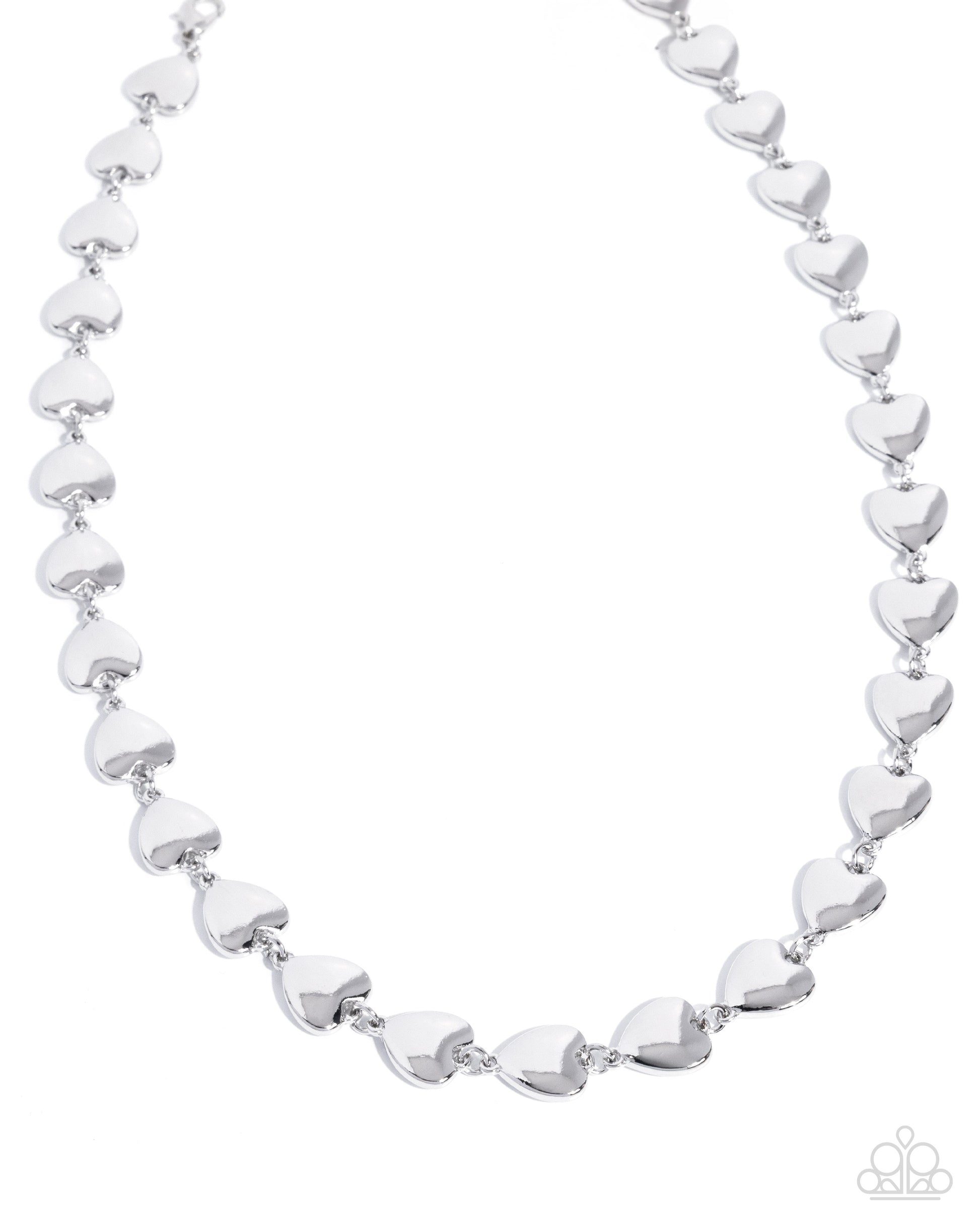 Silver heart-shaped beaded necklace on a white background