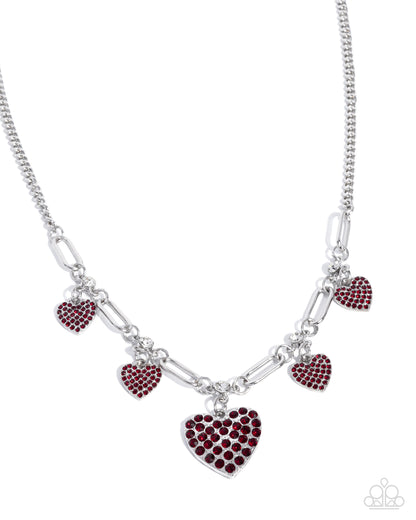 Necklace with heart-shaped charms on a white background
