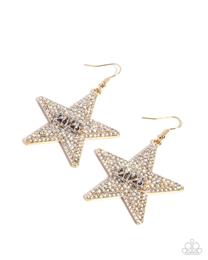 Star-shaped earrings with gold and clear gemstones on a white background