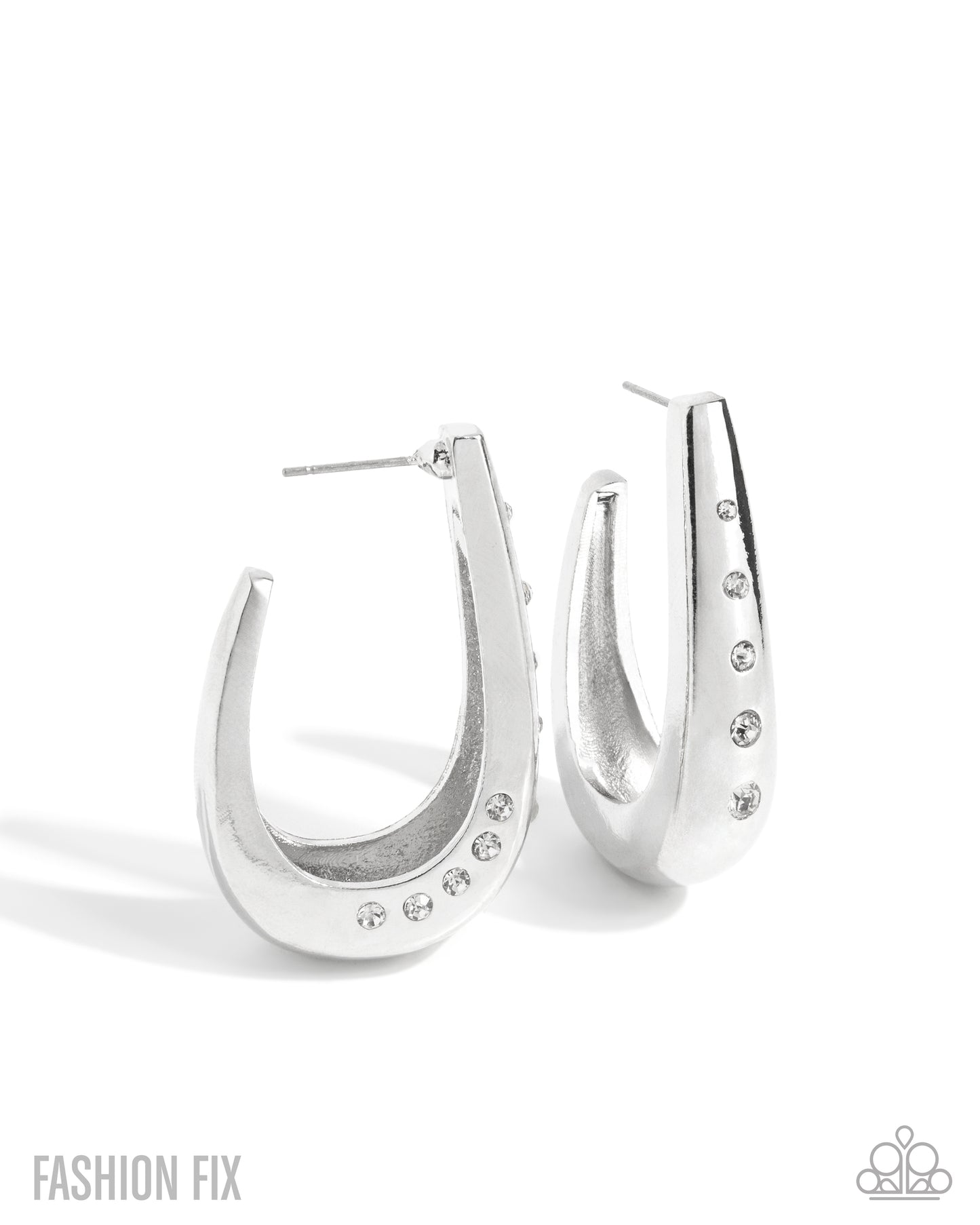 Silver hoop earrings with gemstones on a white background