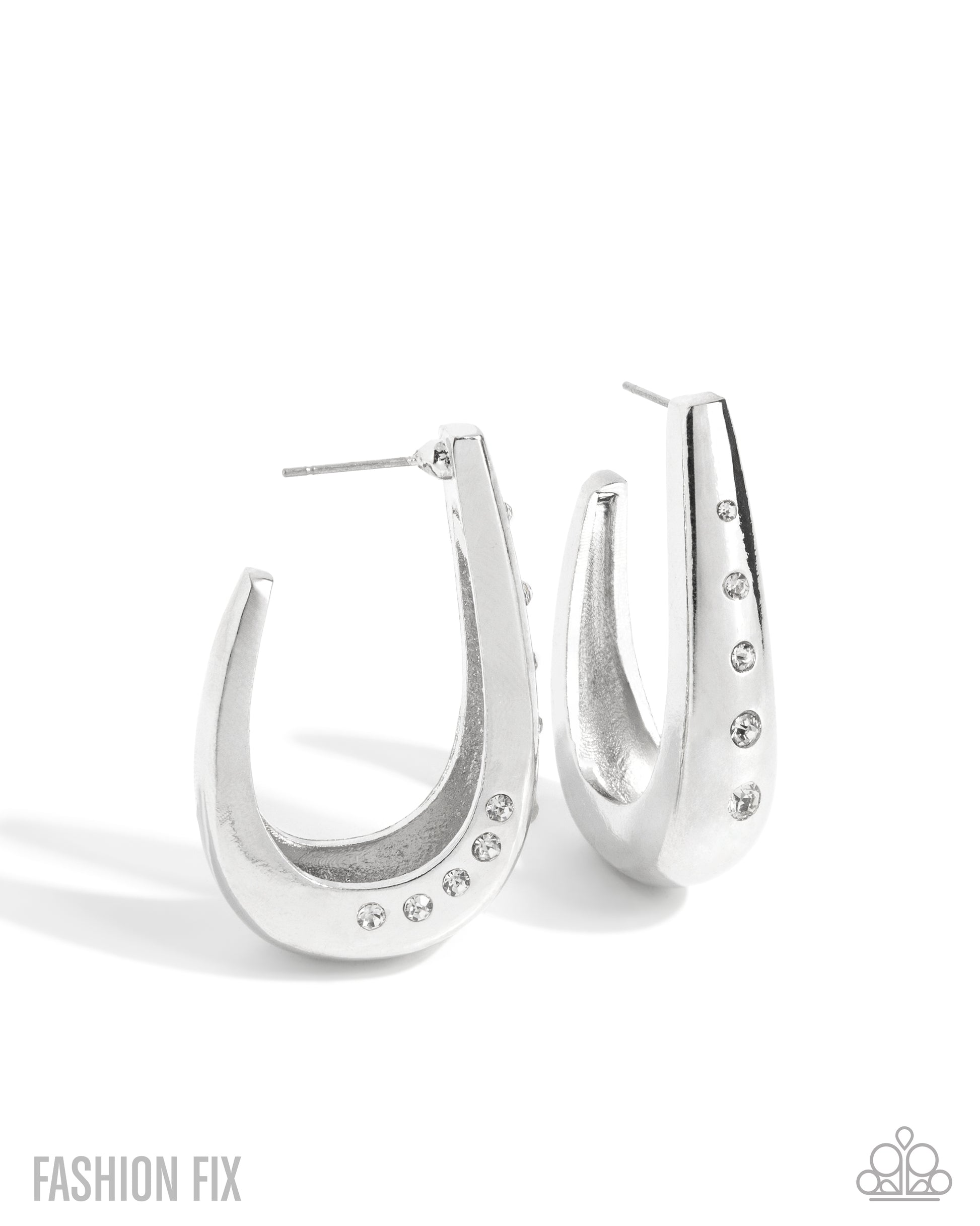 Silver hoop earrings with gemstones on a white background