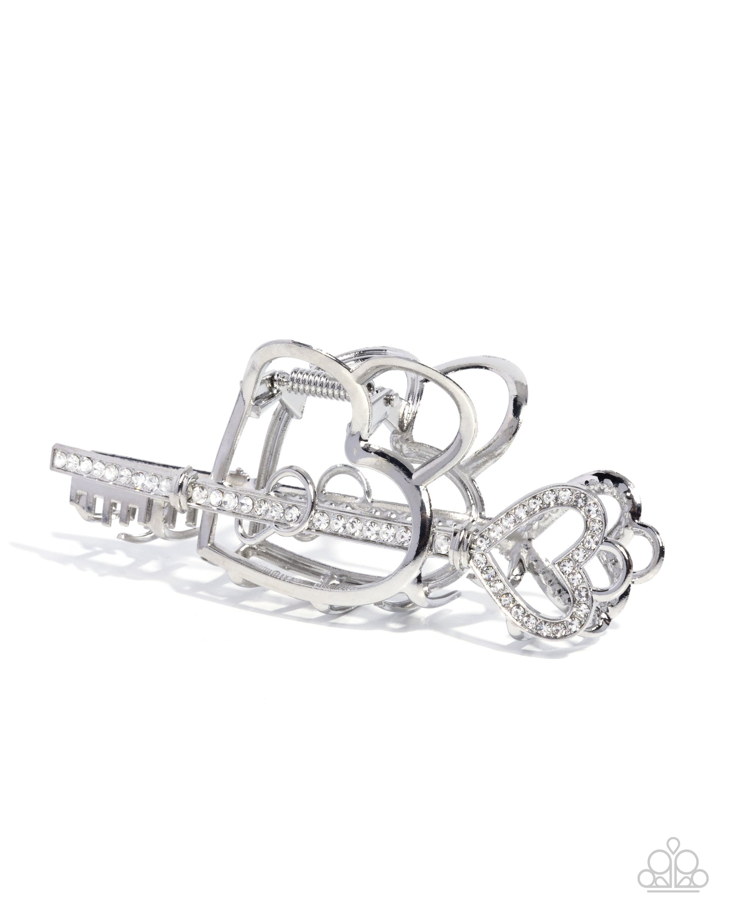 Silver hair clip with heart and bow design on a white background