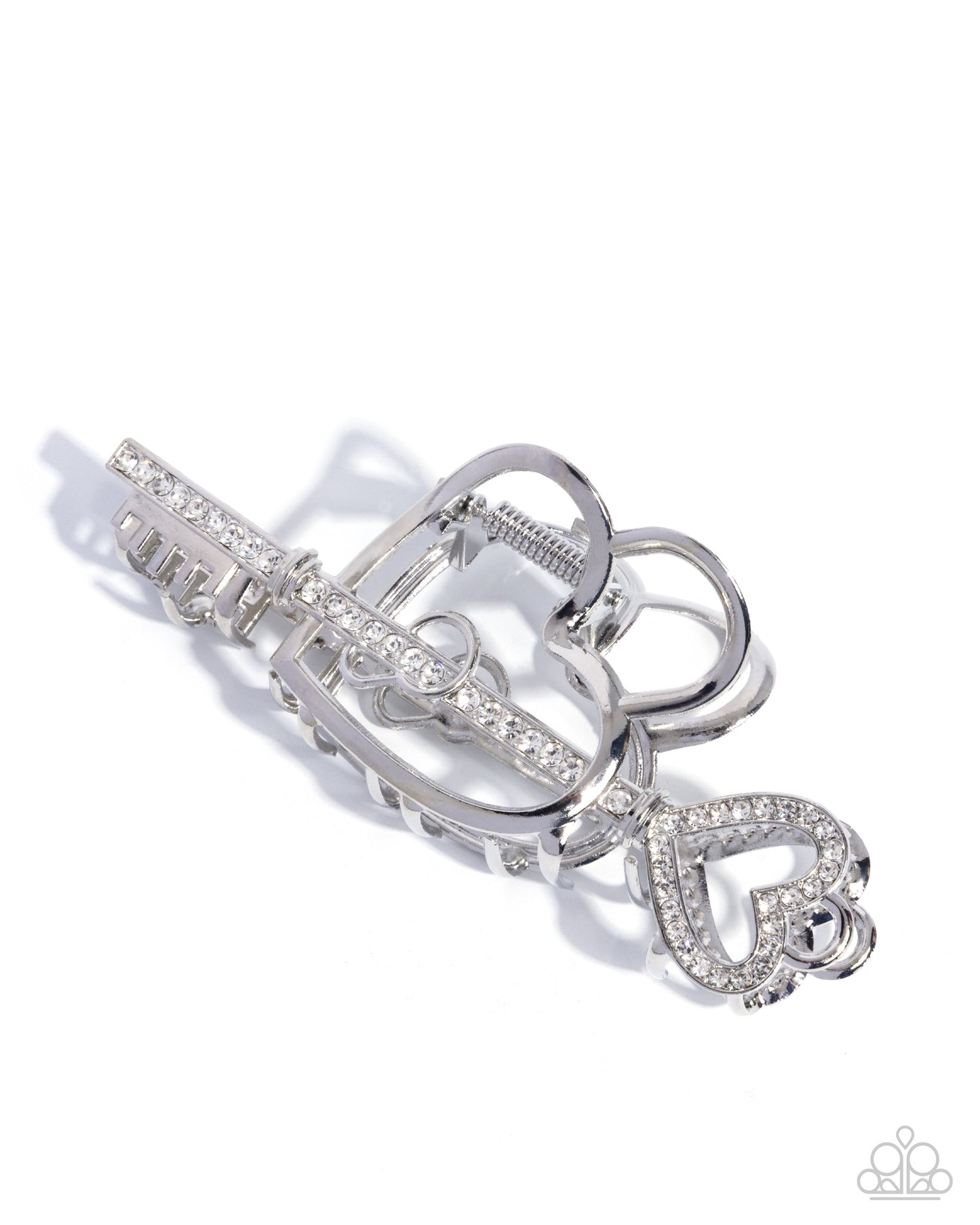 Silver key-shaped jewelry set on a white background