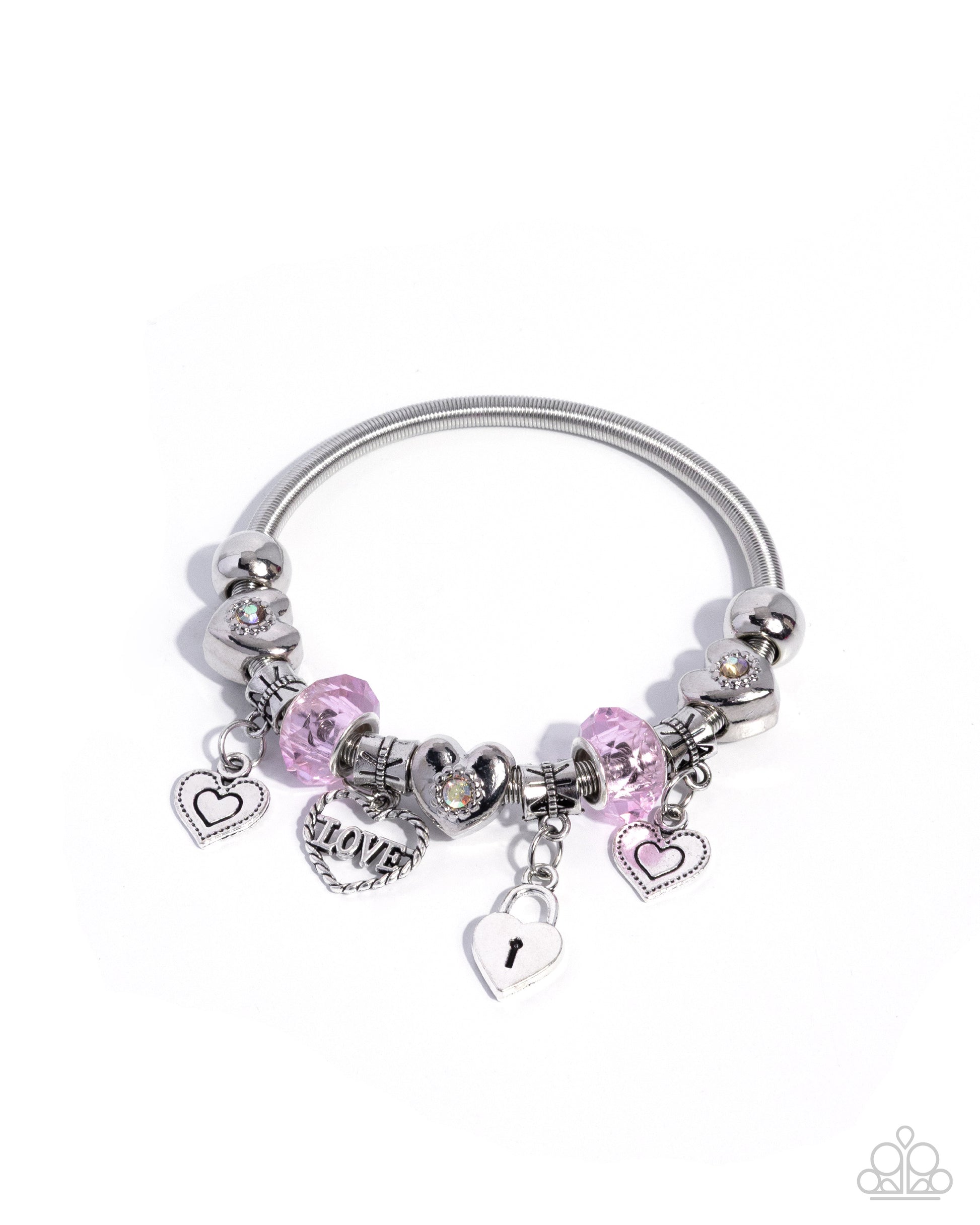 Silver bracelet with pink charms on a white background
