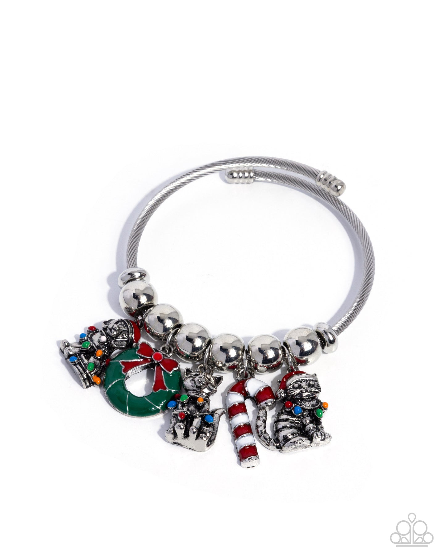 Silver bracelet with Christmas-themed charms on a white background