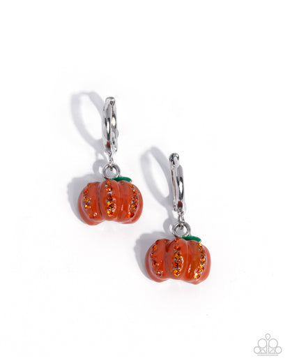 Pumpkin-shaped earrings with orange and green details on a white background