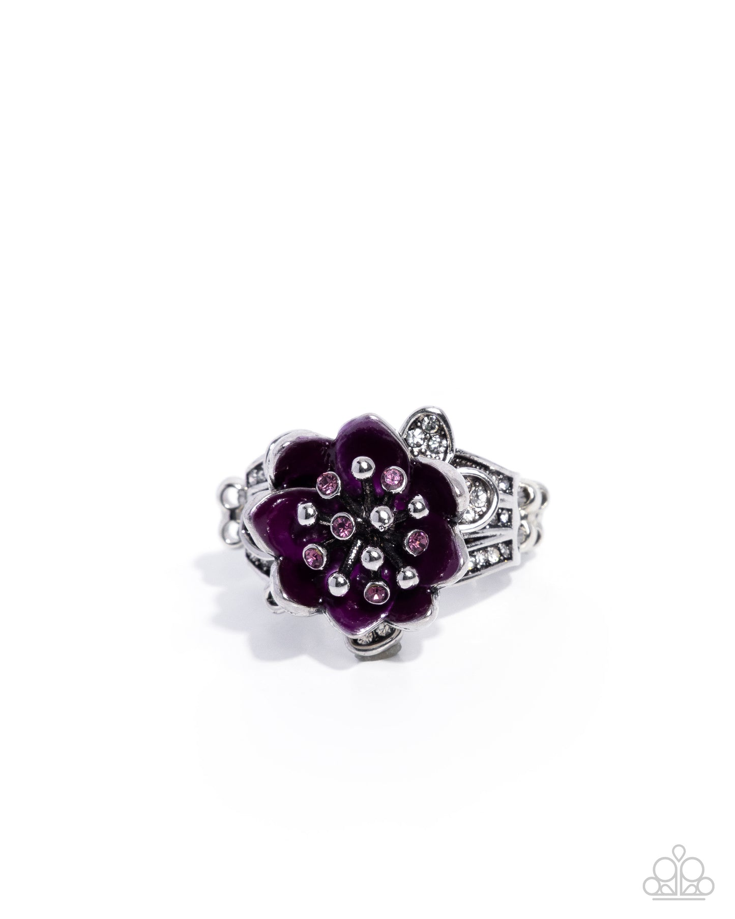 A silver-tone ring designed as a lotus flower, featuring deep purple enamel petals and small pink rhinestones in the center, set against a plain white background.
