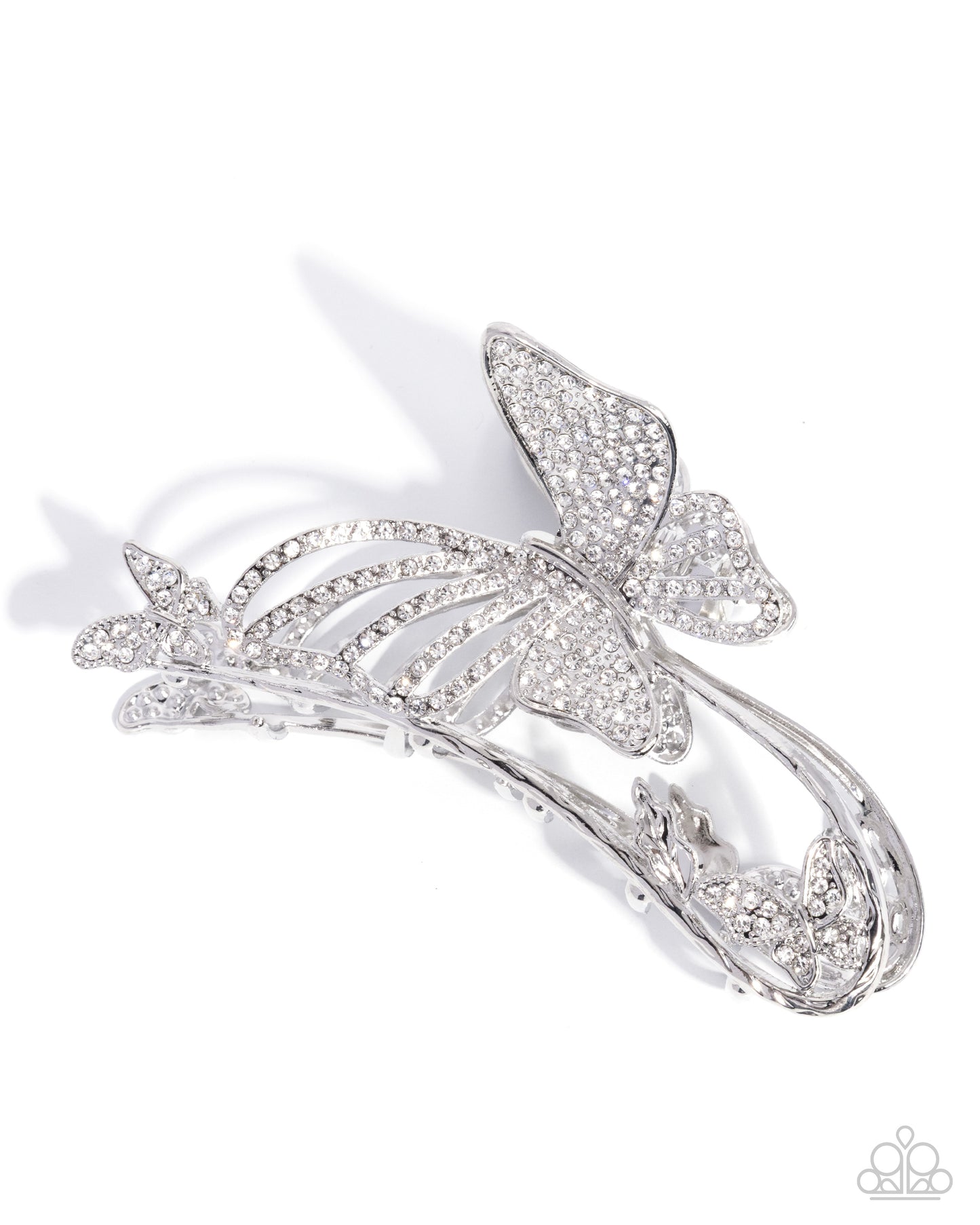 Silver butterfly brooch on a white background