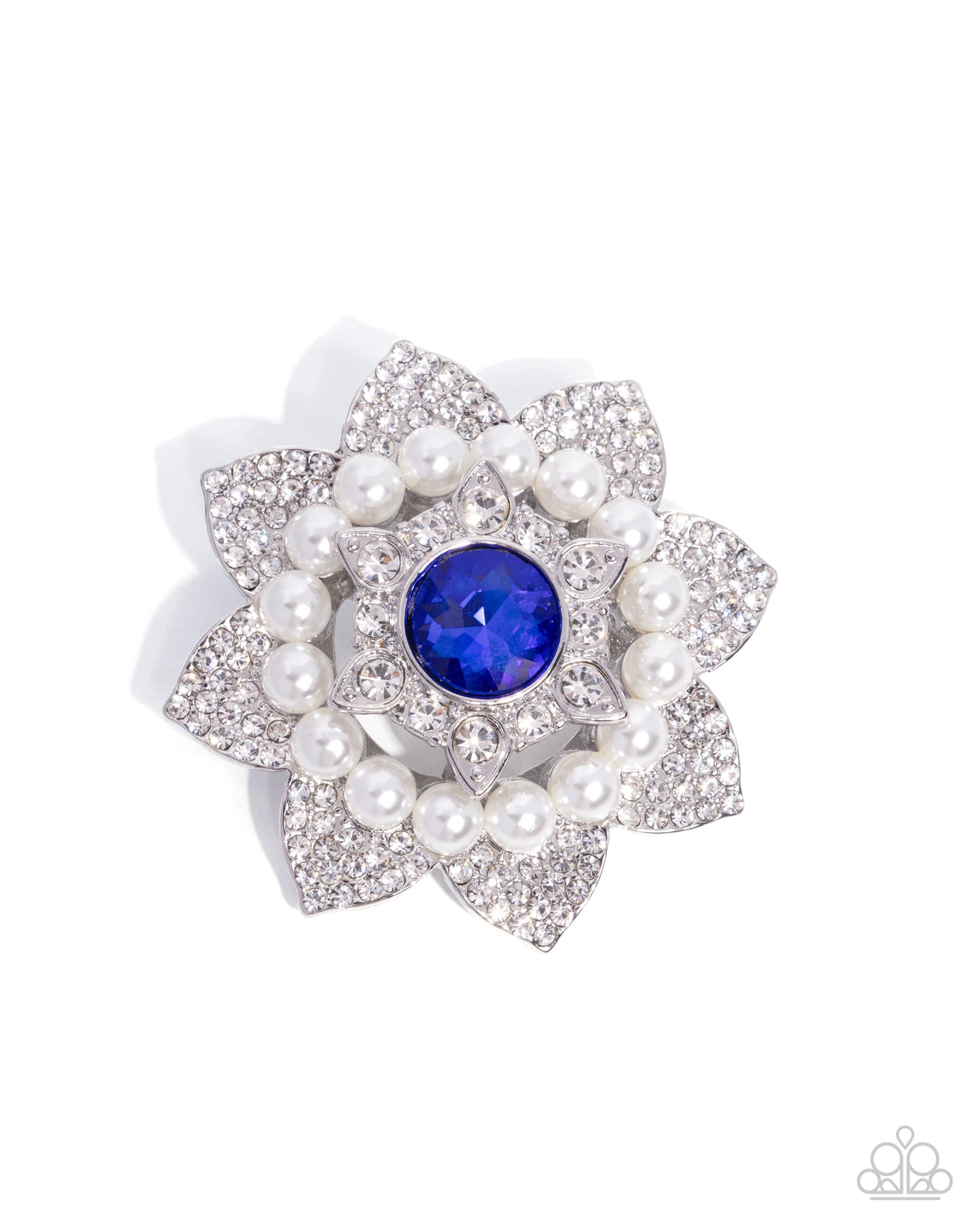 Floral brooch with pearls and a blue gemstone on a white background