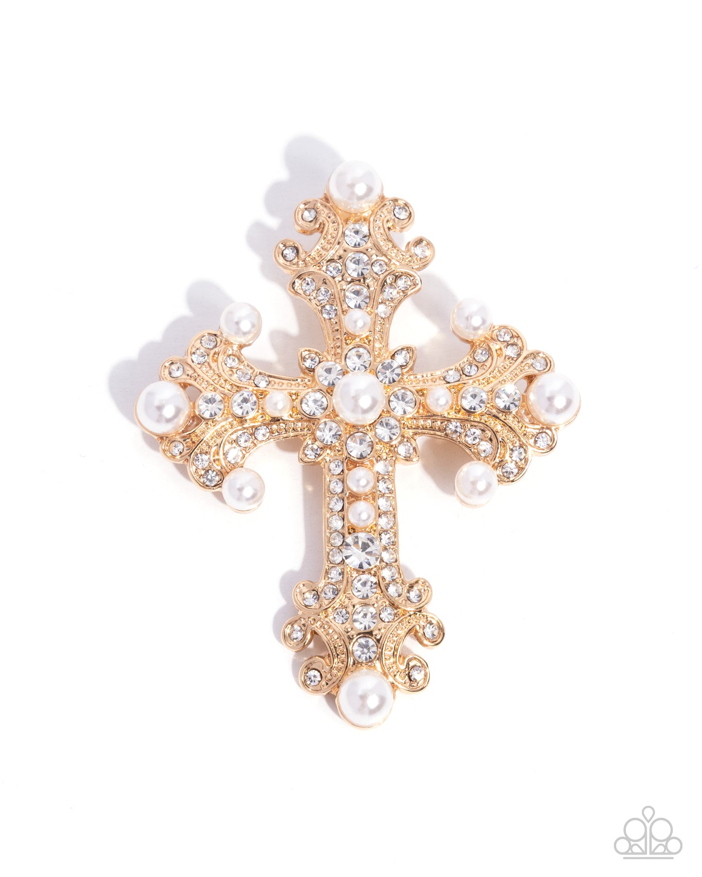 Gold cross brooch with pearls and crystals on a white background