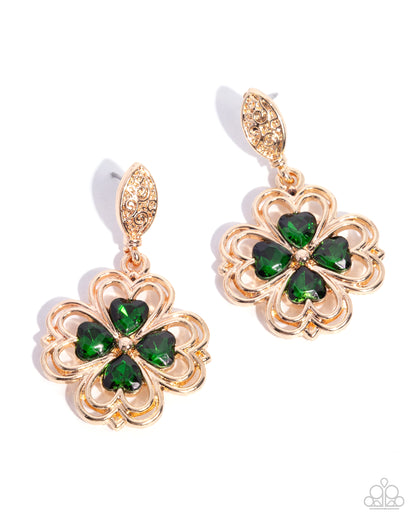 Gold and green clover-shaped earrings on a white background