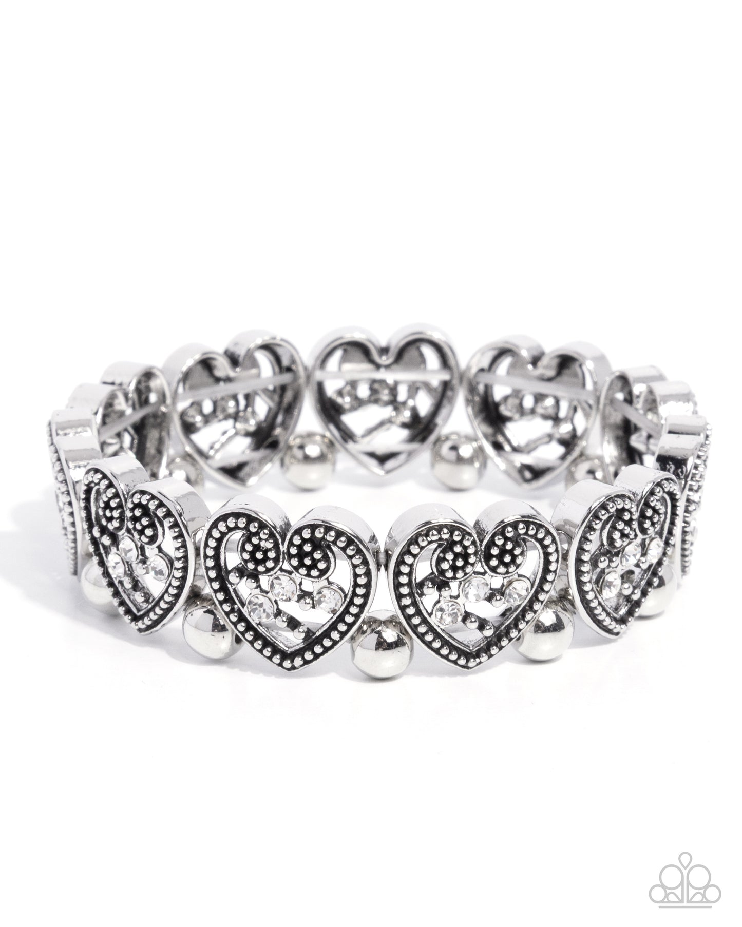 Silver bracelet with heart designs on a white background