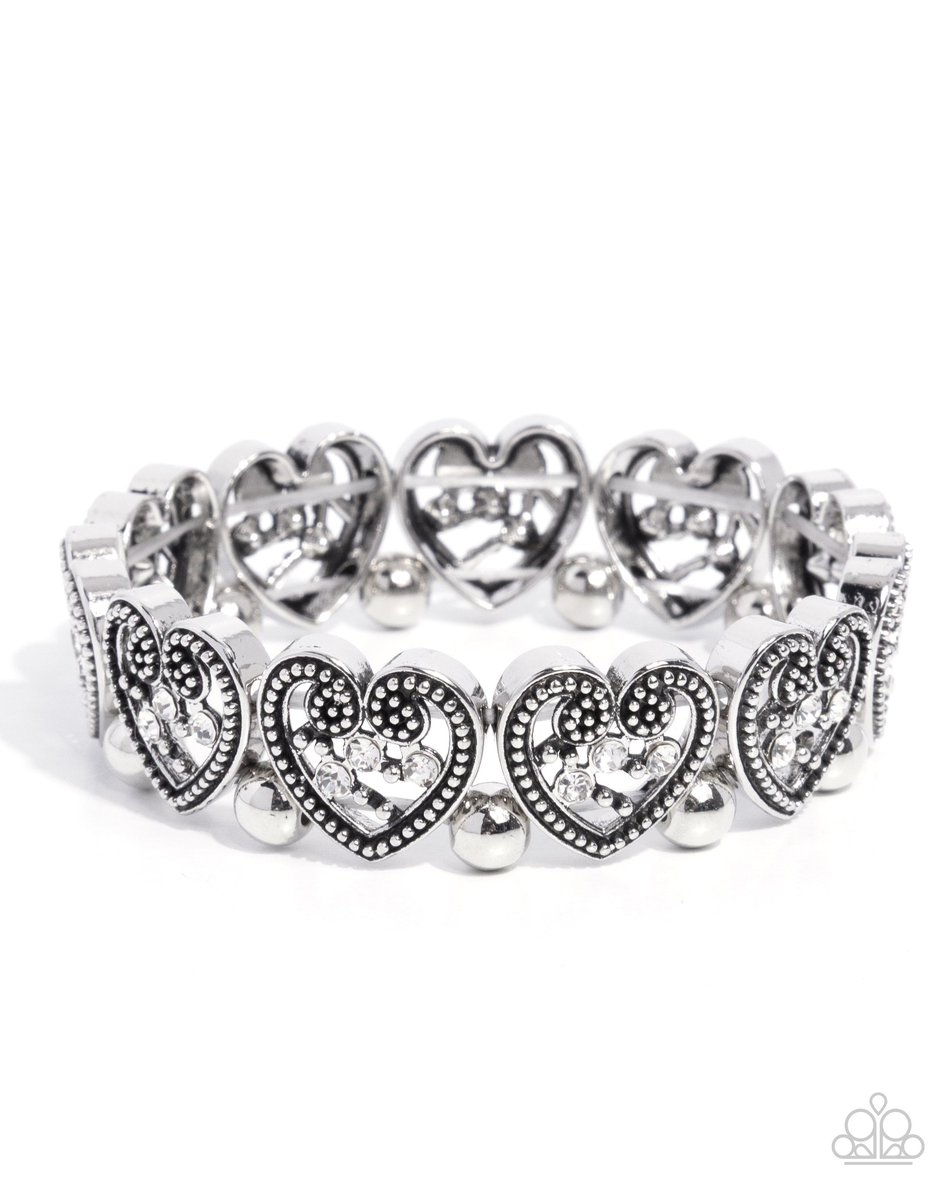 Silver bracelet with heart designs on a white background