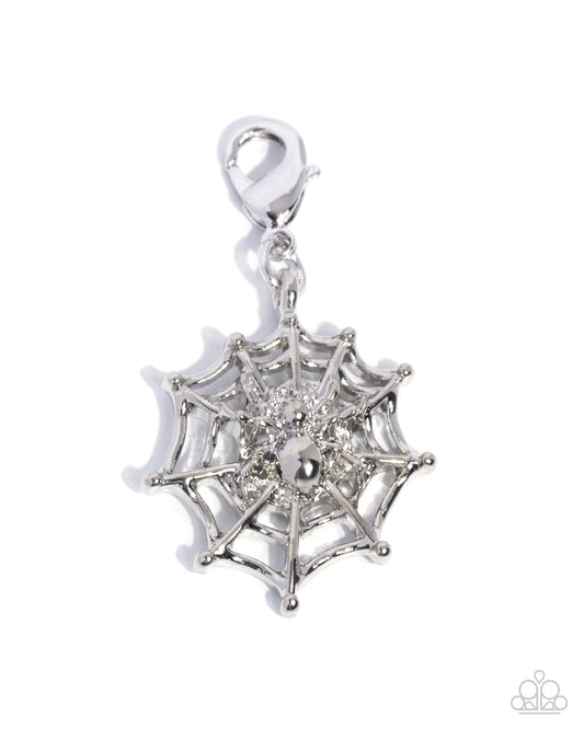 Silver spider web pendant on a white background