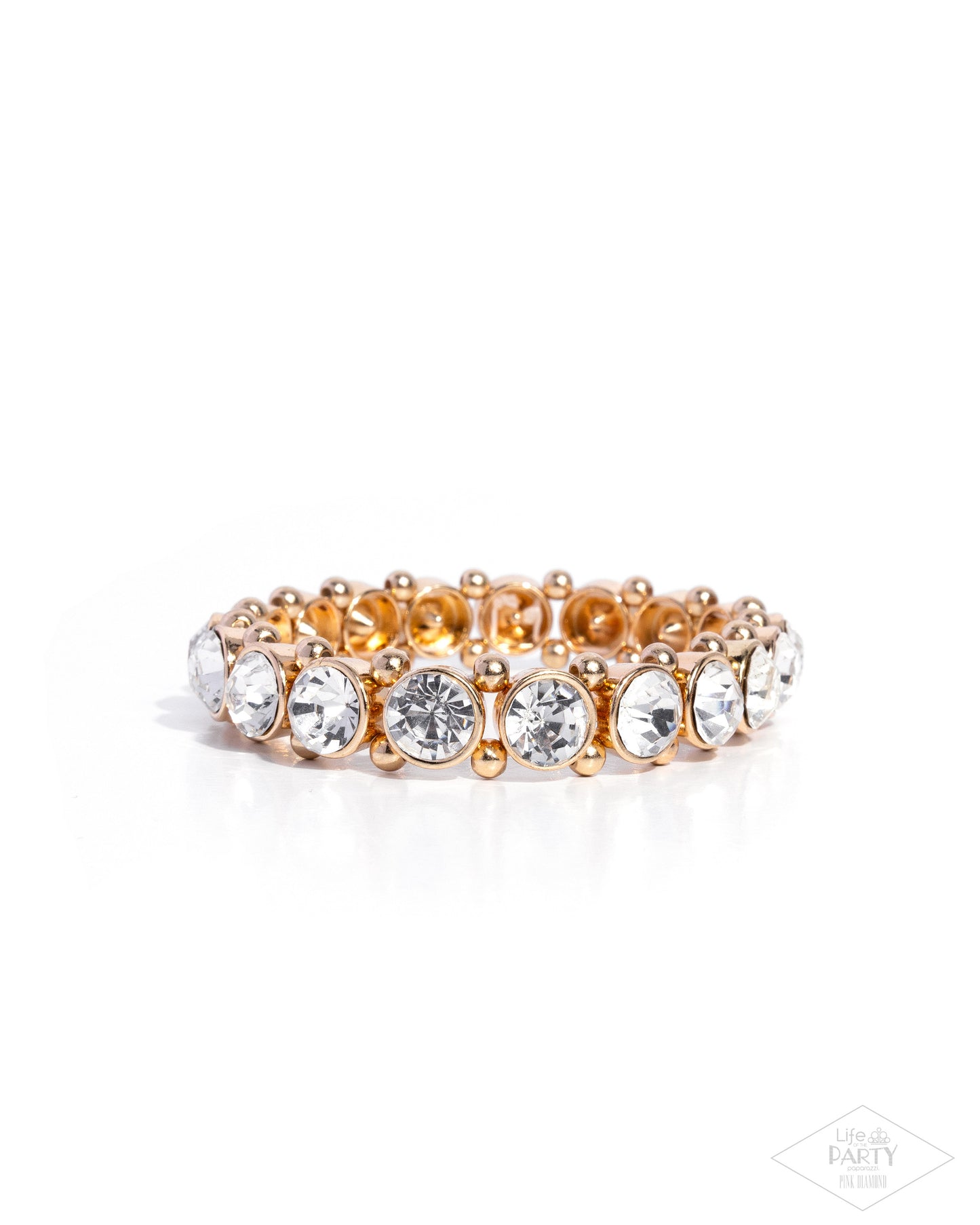 Gold bracelet with clear gemstones on a white background