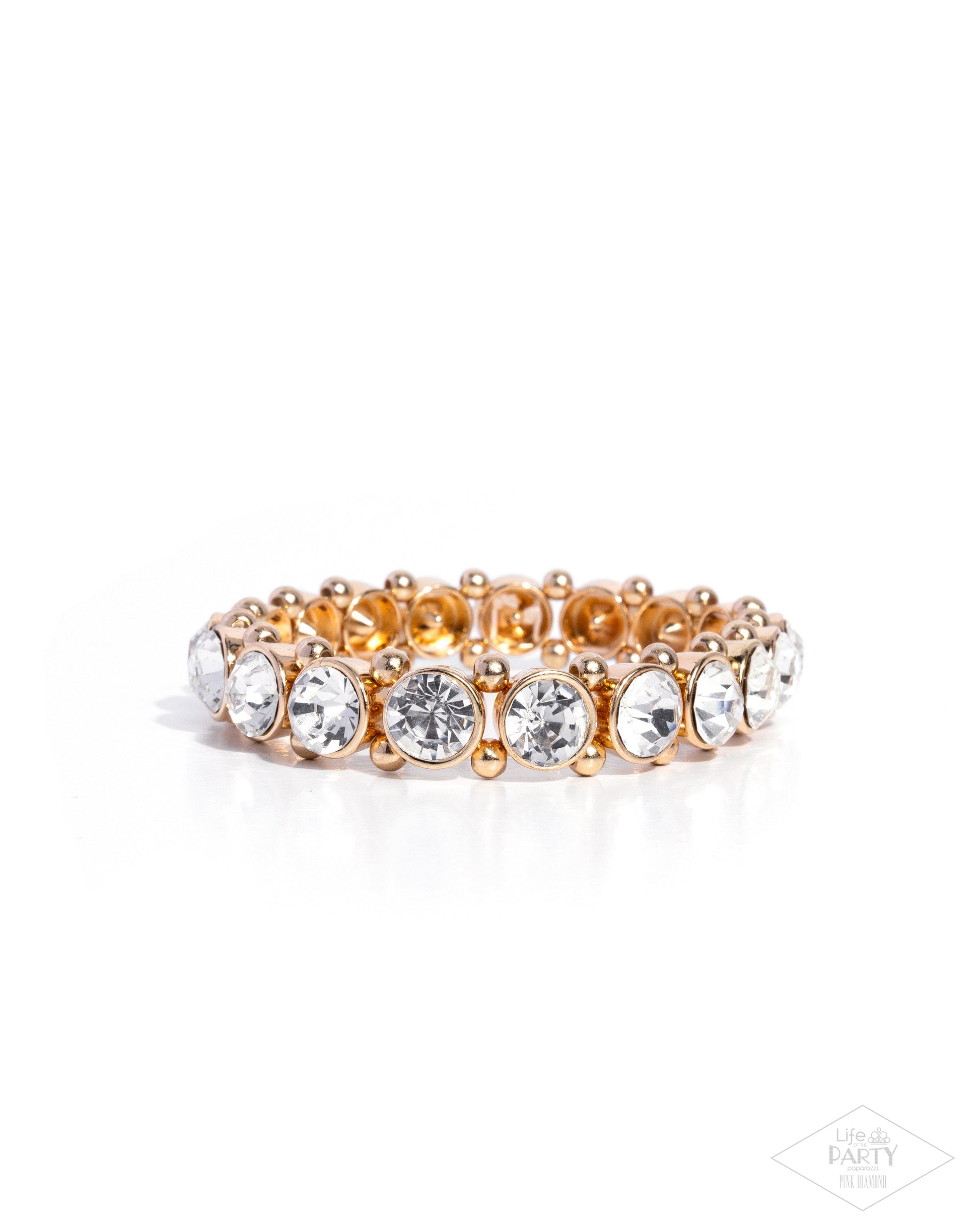 Gold bracelet with clear gemstones on a white background