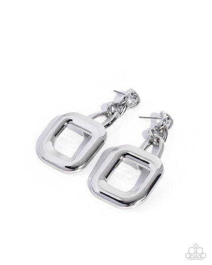 Silver hoop earrings on a white background