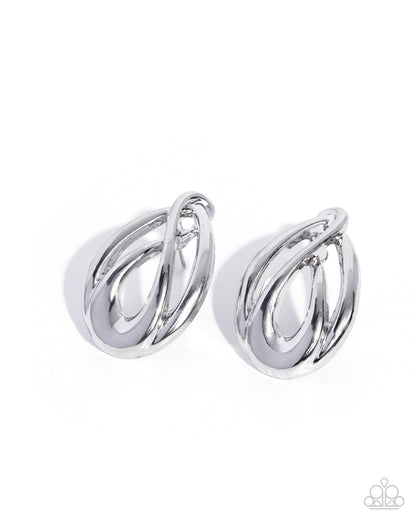 Pair of silver hoop earrings on a white background