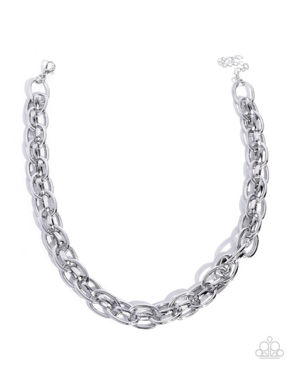 Silver chain necklace on a white background