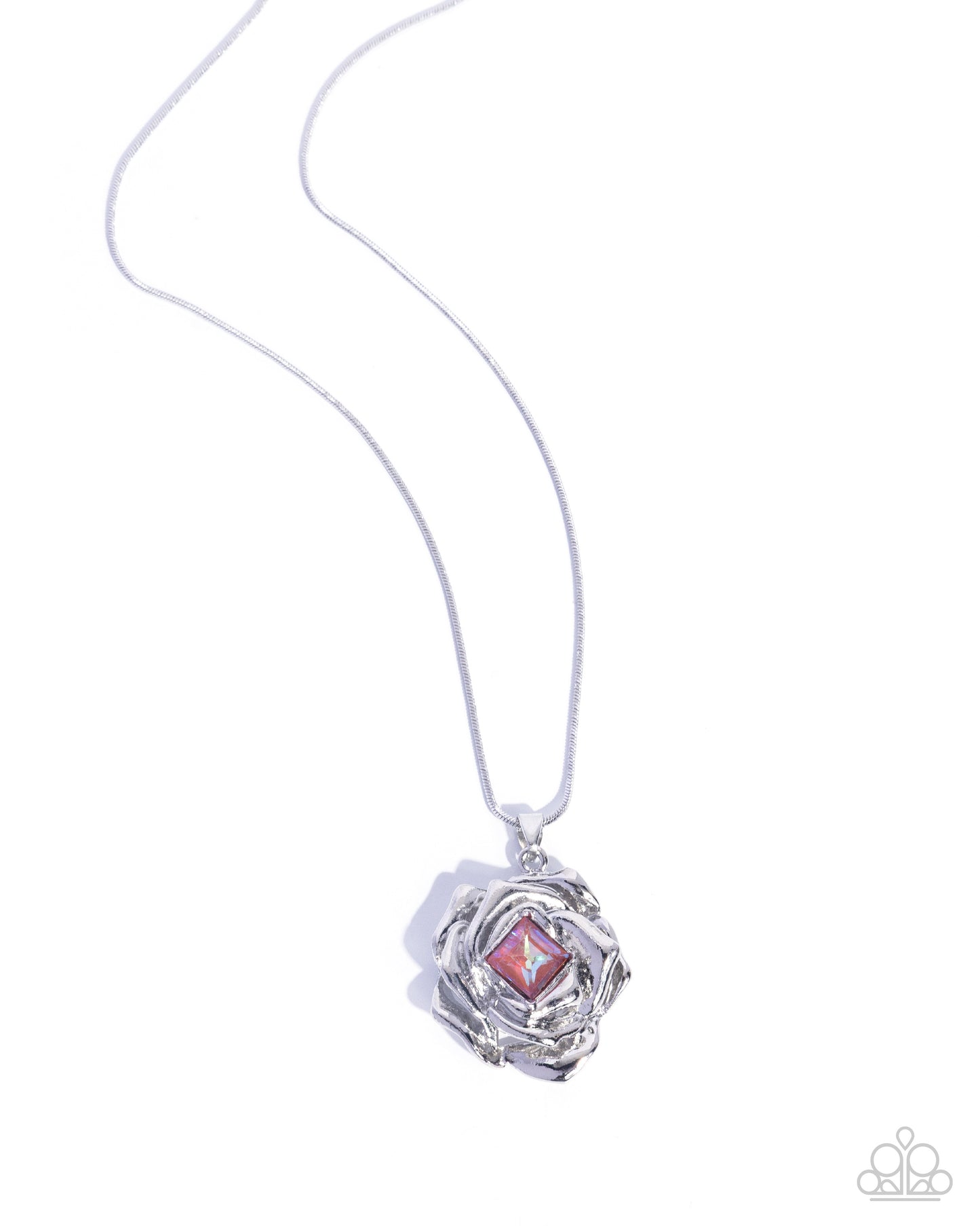 Necklace with a silver pendant featuring a pink gem on a white background