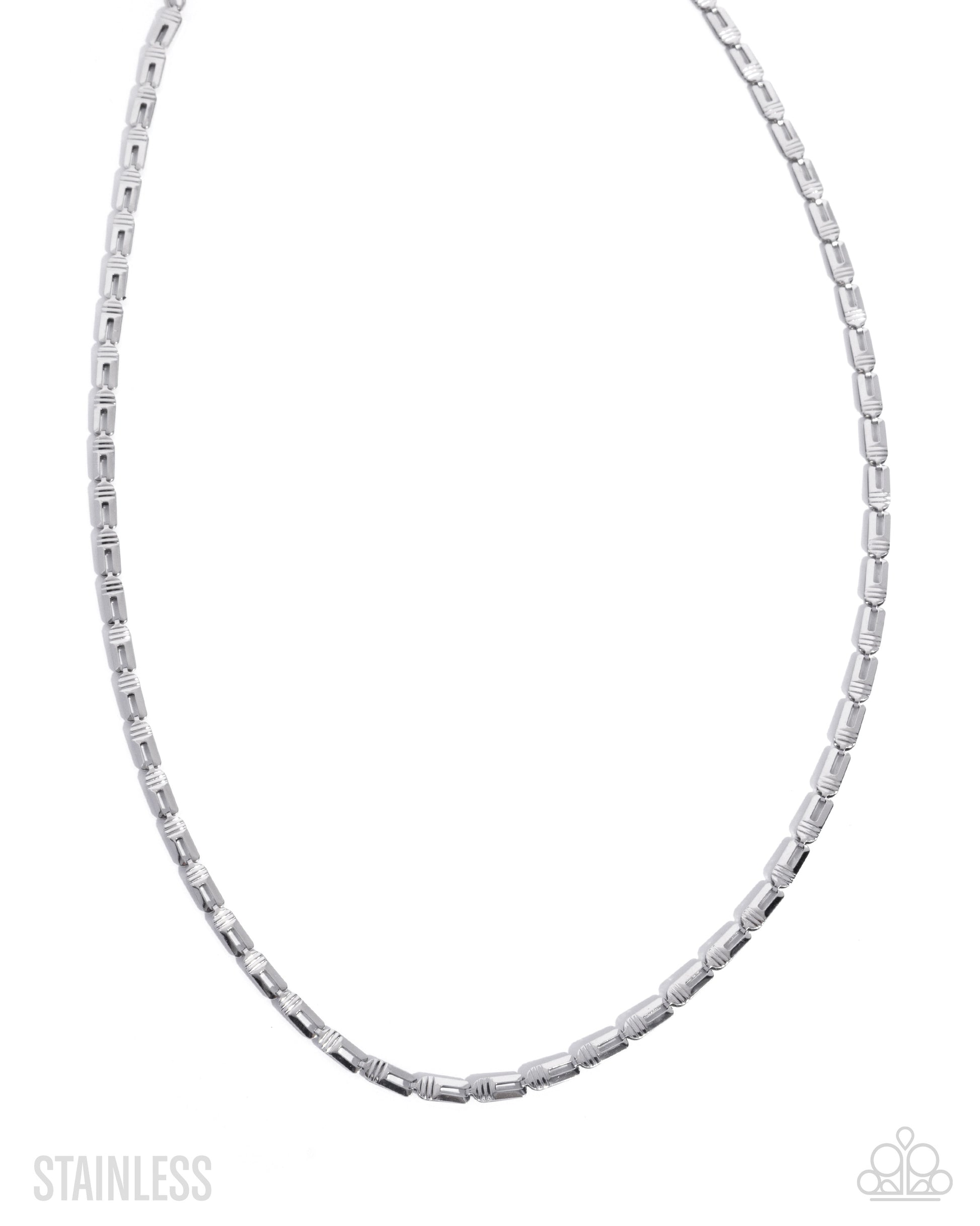 Silver chain necklace on a white background